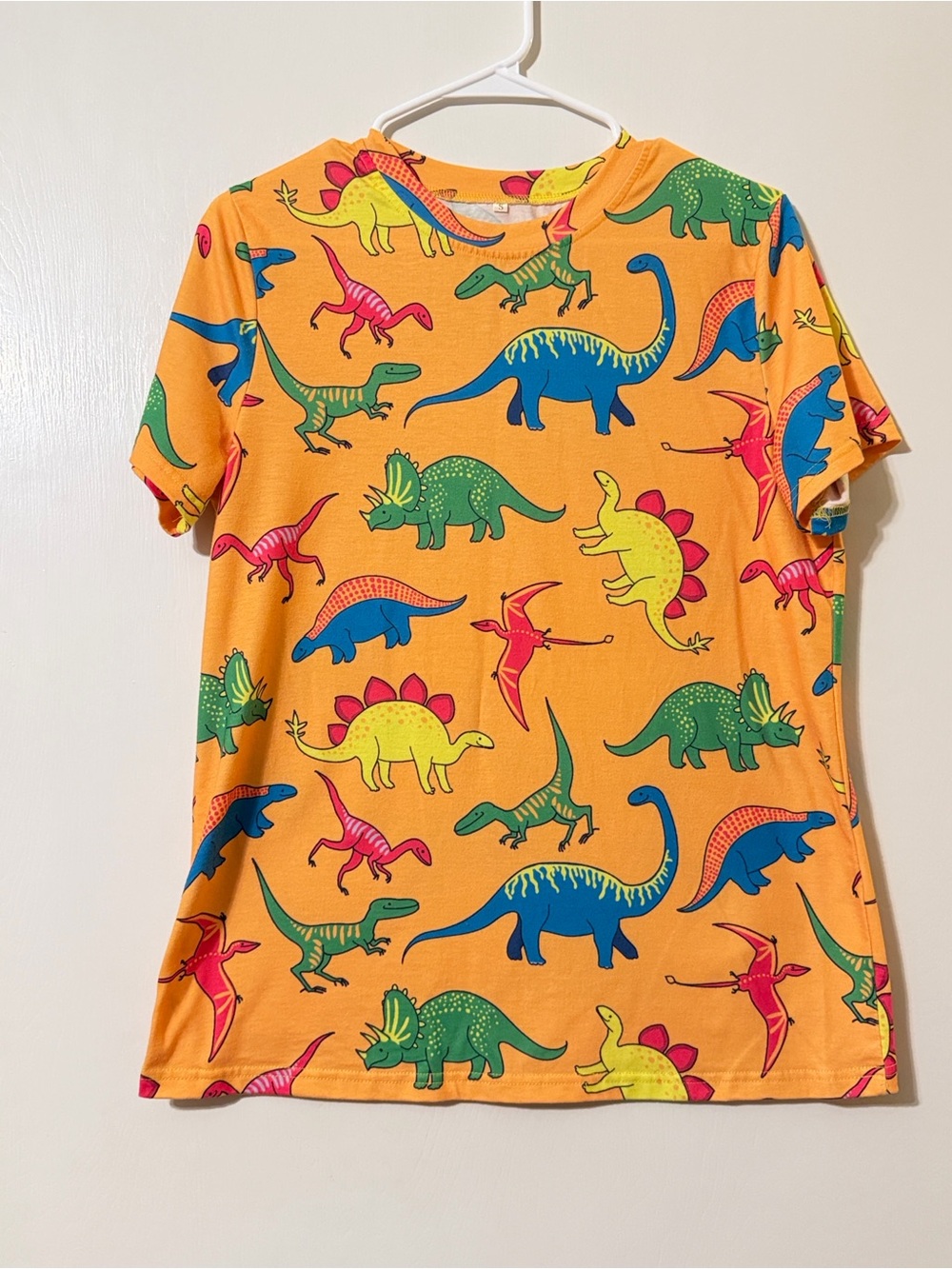 Women’s Orange Dinosaur Graphic Short Sleeve Tee